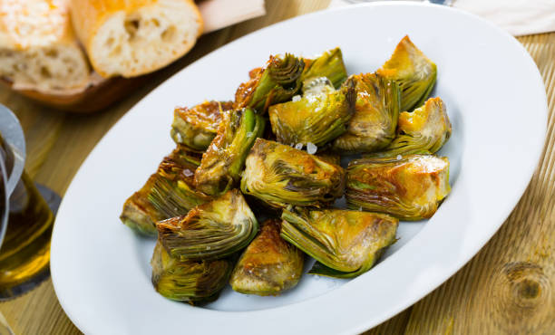 istock Vegetarian dish - roasted artichokes 1141743151