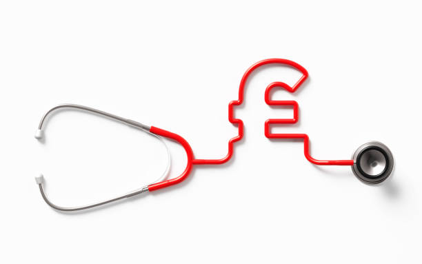 istock Red Stethoscope Forming A British Pound Symbol On White Background 1141748769