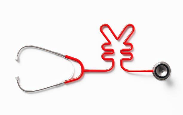 istock Red Stethoscope Forming A Yen Symbol On White Background 1141748803