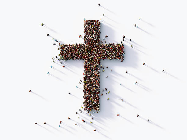 Human Crowd Forming A Cross Shape Human crowd forming a cross shape on white background. Horizontal  composition with copy space. Clipping path is included. Faith and social Media concept. catholic cross stock pictures, royalty-free photos & images
