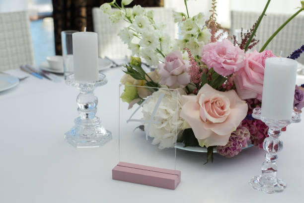istock Event white restaurant table served and decorated with delicate fresh flowers 1141754471