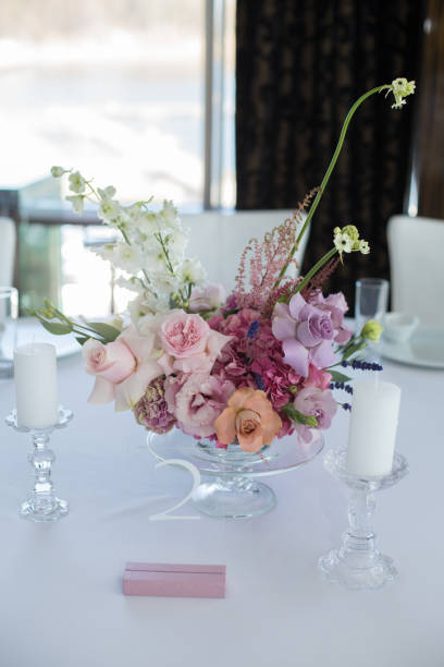 istock Event white restaurant table served and decorated with delicate fresh flowers 1141755098