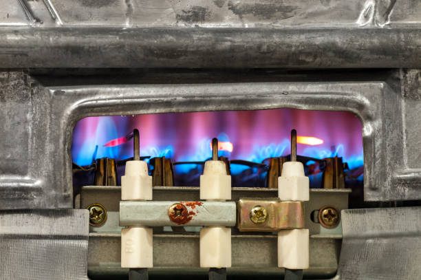 istock Gas burns in water heater. 1141755119