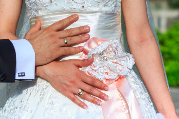 istock Wedding Couple and rings in hands 1141755200