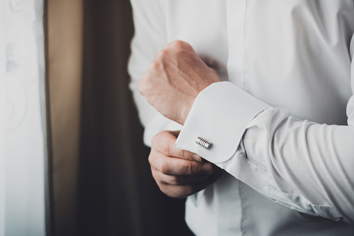 hands correct fastening cuffs white dress shirts,groom 2019