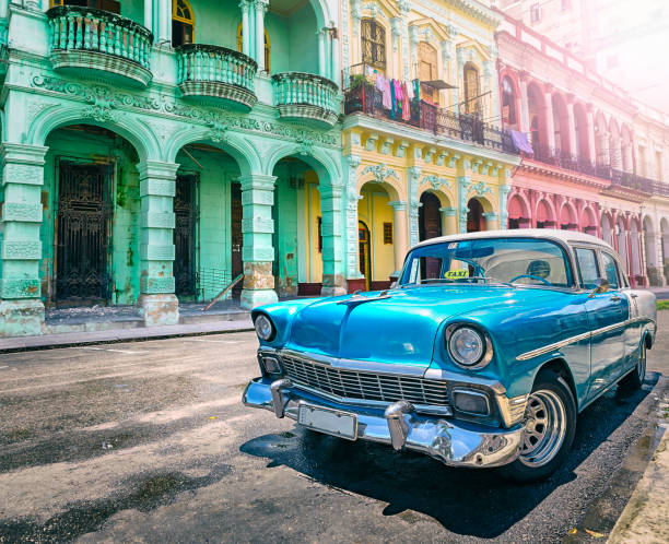 istock Vintage blue oldtimer car driving through Old Havana Cuba 1141756613