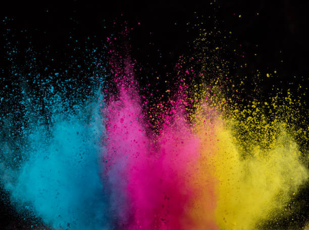 istock Explosion of colored powder isolated on black 1141758498