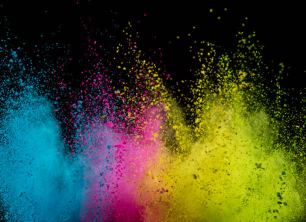 istock Explosion of colored powder isolated on black 1141758547