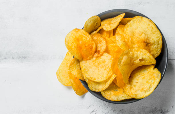 istock Potato chips in the bowl . 1141759284