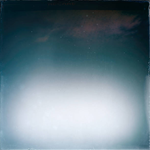istock Retro photographic film effect. Vintage gradient background. 1141759690