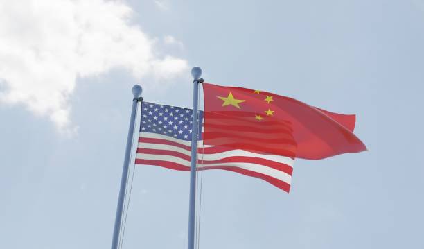 China and USA, two flags waving against blue sky China and USA, two flags waving against blue sky. 3d image china digital flag stock pictures, royalty-free photos & images