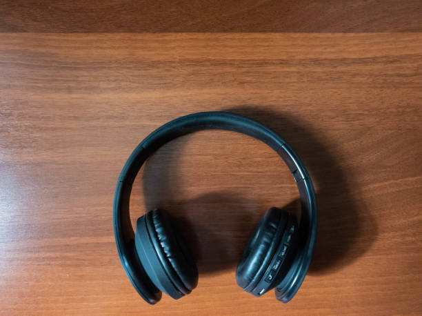 istock The Wireless bluetooth headphones in black close-up 1141761660