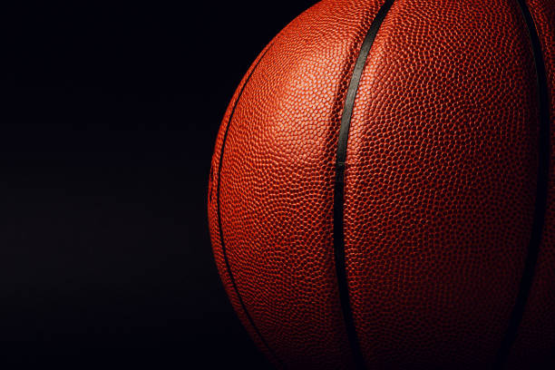 istock basketball ball on black background. 1141762254