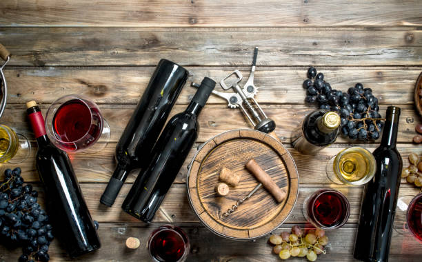 istock Wine background. White and red wine in glasses. 1141763603