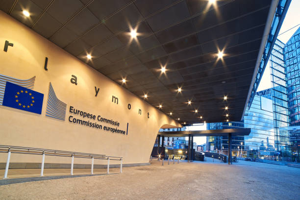 Entrance of the Berlaymont building, headquarters of the European Commission with the organization logo. stock photo