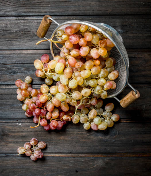 istock White grapes in a saucepan. 1141765223