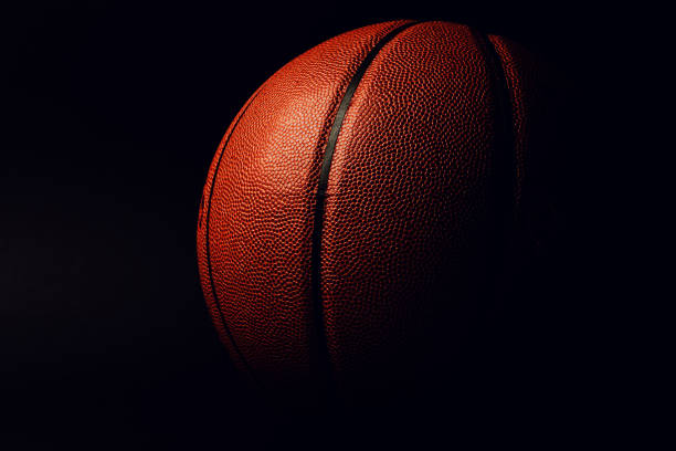 istock basketball ball on black background. 1141766663