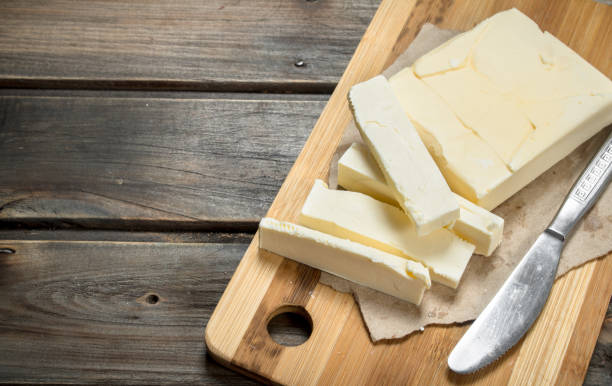 istock Butter with a knife on the Board. 1141767549