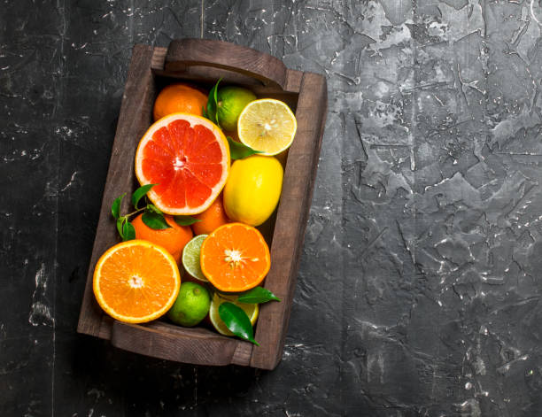 istock Juicy citrus in a wooden box. 1141767839