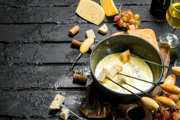 istock Delicious fondue cheese with white wine. 1141770408