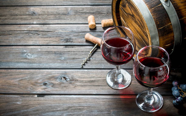 istock Wine background. An old barrel of red wine. 1141770538