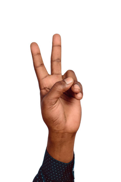 istock Man hand victory sign gesture 1141771686