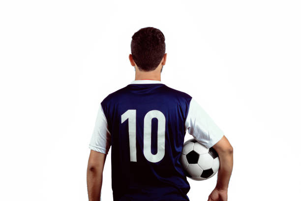 Portrait of young man with football ball. Sport concept.