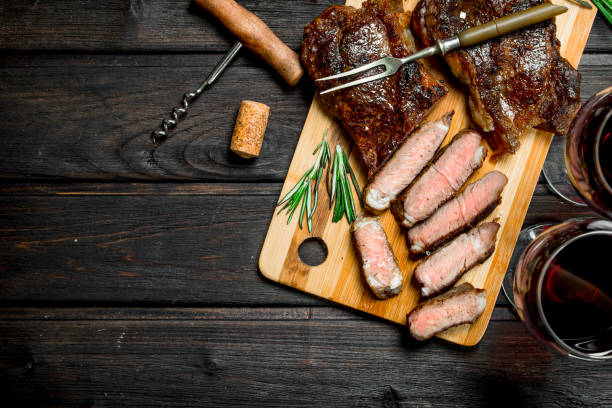 istock Grilled beef steak with red wine. 1141772604