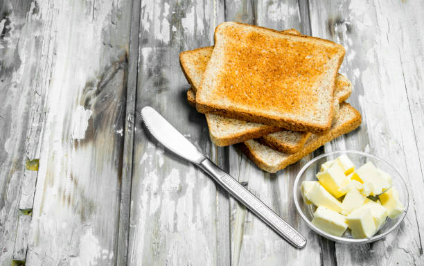 istock Breakfast. Toasted bread and butter . 1141774587