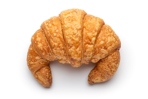 Croissant photographed on white background