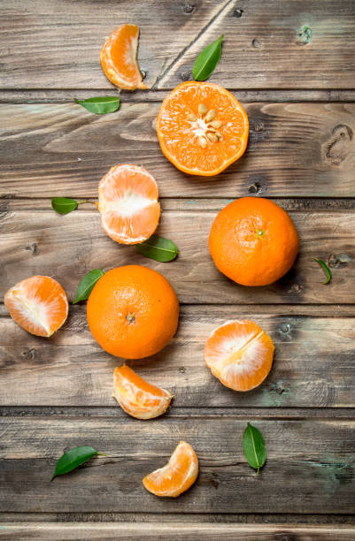 istock Pieces of fresh mandarins. 1141775033