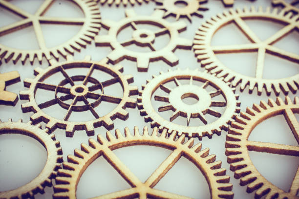 istock Gear wheels on white background as concept of engineering 1141776320