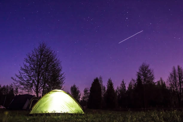 istock tent at night under the starry sky 1141779461