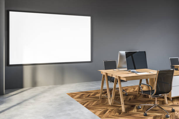 istock Gray office with big poster 1141779529