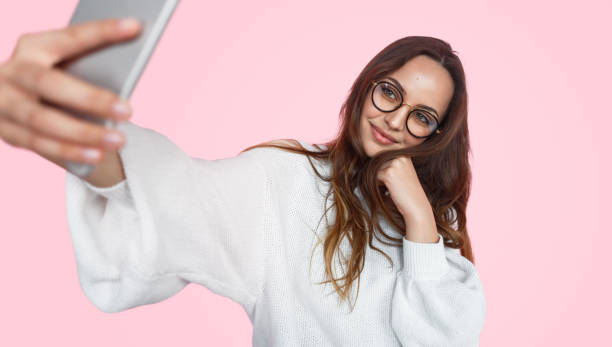 istock Pretty woman taking selfie 1141779859