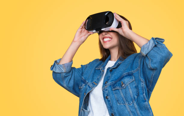 istock Happy woman wearing VR headset 1141779902
