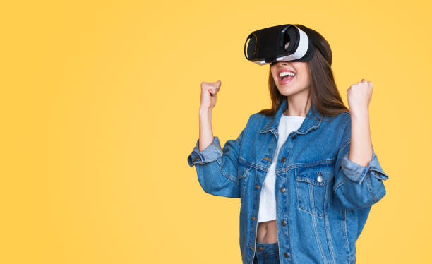 istock Amazed woman in VR headset 1141779918