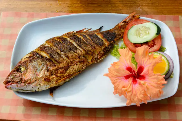 Fried whole fish is a traditional dish in Costa Rica