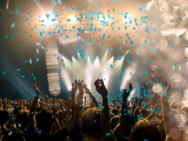 istock Concert crowd in front of a live stage 1141786364
