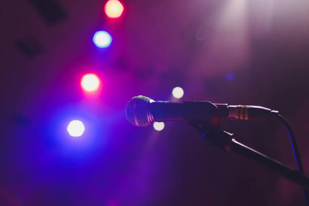 istock microphone against blur on beverage in pub and restaurant background. 1141790152