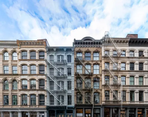 Photo of Exterior view of old apartment buildings in the SoHo neighborhood of Manhattan in New York City