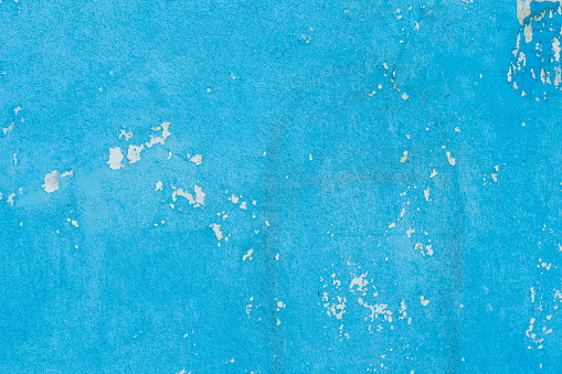 Cement painted old wall background, baby-blue pastel color texture