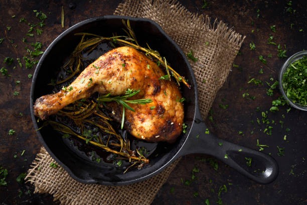 istock Chiken leg in a skillet 1141801931