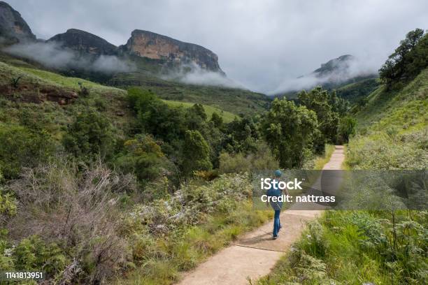 Female Hiker Enjoys Hiking In The Mountains Stock Photo - Download Image Now - Drakensberg Mountain Range, South Africa, Hiking