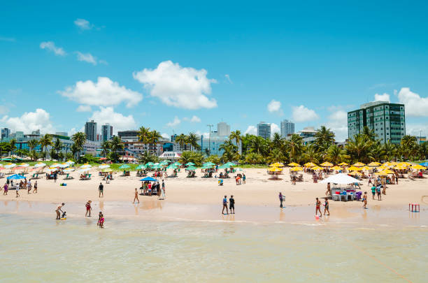 Tambau Beach, Joao Pessoa PB Brazil Joao Pessoa - PB, Brazil - February 24, 2019: View of Praia de Tambau beach and the city on background. People on a sunday enjoying the most touristic beach of the city. paraiba photos stock pictures, royalty-free photos & images
