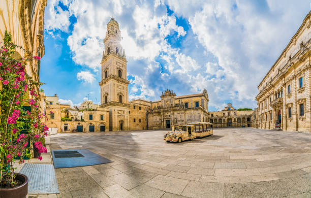 Lecce, Italy - August 13, 2018: Piazza del Duomo square and Virgin Mary Cathedral in Lecce, Puglia region, southern Italy