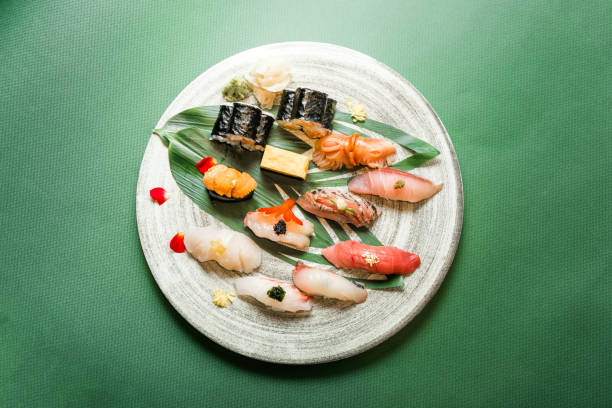 sushi-mix - seafood prepared shrimp prawn avocado stock-fotos und bilder