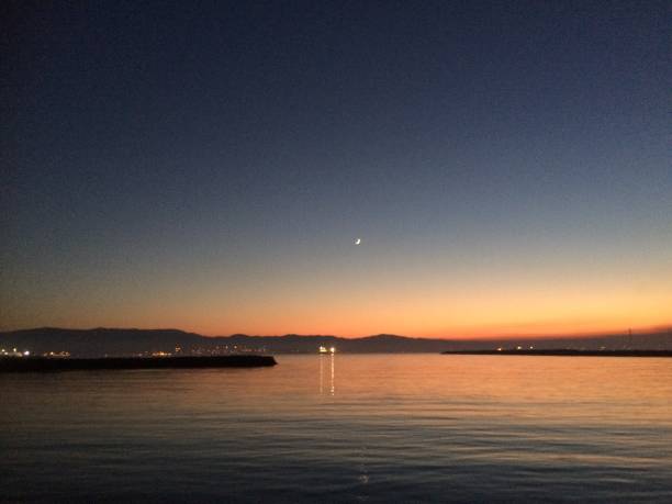 istock Sunset and moon over Bay of Gibraltar 1141826336
