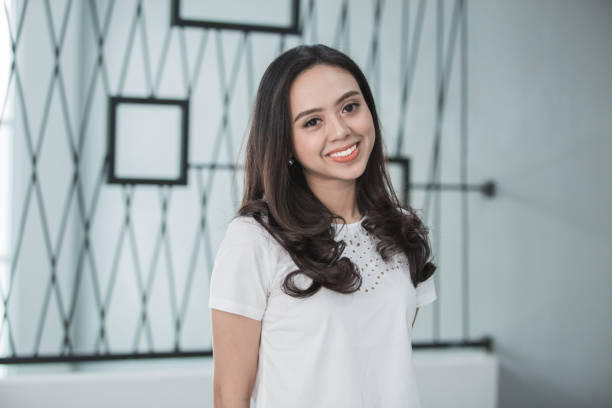 istock asian Pretty woman smiling 1141831373