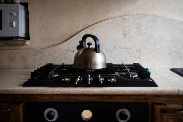 istock Inox steel coffee machine on an old domestic kitchen 1141839576